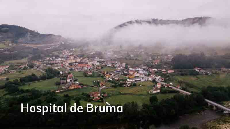 Hospital de Bruma on the Camino Inglés – A Misty Morning in Galicia Aerial view of Hospital de Bruma village covered in morning mist, Galicia, Spain